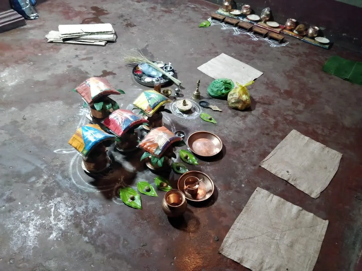 Copper kalashas dressed in vastra